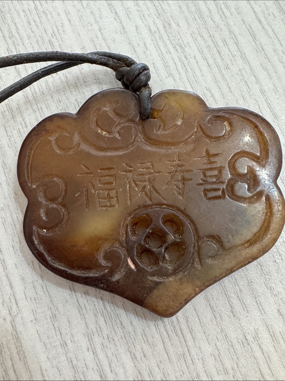 vintage Chinese carved brown nephrite or serpentine jade pendant